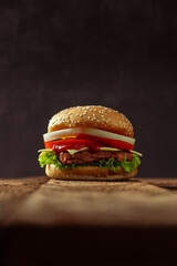hamburger isolated on brown wooden floor background.