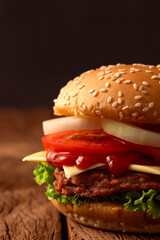 hamburger isolated on brown wooden floor background.