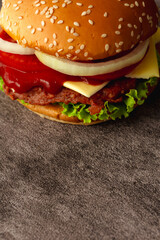hamburger isolated on brown wooden floor background.