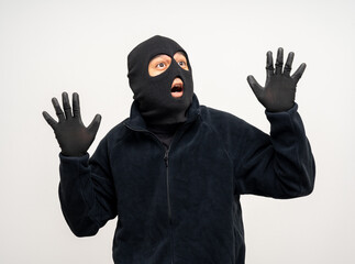 Thief in uniform black jacket various pose on isolated background. The Robber terrorism criminal...