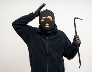 Thief in uniform black jacket various pose on isolated background. The Robber terrorism criminal...