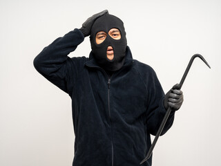 Thief in uniform black jacket various pose on isolated background. The Robber terrorism criminal...