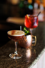 Cute cocktails in the stylish bar aperol spritz, Moscow mule, coffee spritz