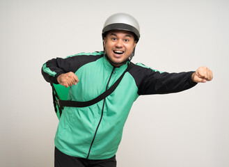 Young asian rider wearing green jacket uniform and helmet various action holding a lot of paper parcel delivery box to customer. Man service worker Courier and shipping food delivery service.