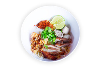 Dry Noodles with Tom Yum and Grilled Pork Thai style noodles, top view, isolate and white background