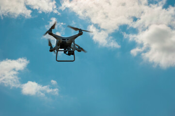 drone with camera flying in the sky, shooting for industry, control or intelligence