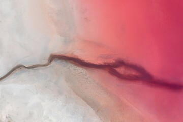 Aerial view of the marine salt lake of Hutt lagoon on a sunny day in Western Australia, Australia