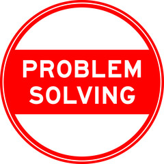 Red color round seal sticker in word problem solving on white background
