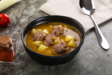 Soup with beef meatball and vegetables