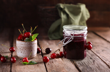 natural organic cherry jam and fresh berries