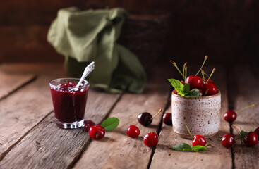 natural organic cherry jam and fresh berries