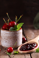 natural organic cherry jam and fresh berries