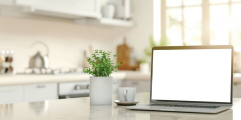 Laptop with Blank Screen in Modern Kitchen