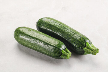 Raw green ripe zucchini vegetable