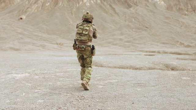 Soldiers carry sniper rifles to fight protect maintain peace and independence along international borders prevent invasion and terrorism : Infantry carefully patrolling the war zone.