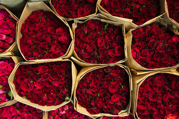 red rose packed with brown paper top down view 