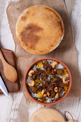 Baked meat in a clay pot, or a traditional pot dish, a stew with vegetables and meat cooked in the oven. Turkish and balkan or oriental food platter, flat lay
