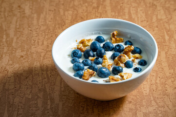 Yoghurt with fresh blueberries and walnuts