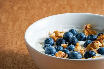 Yoghurt with fresh blueberries and walnuts
