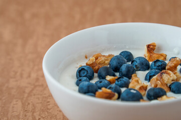 Yoghurt with fresh blueberries and walnuts