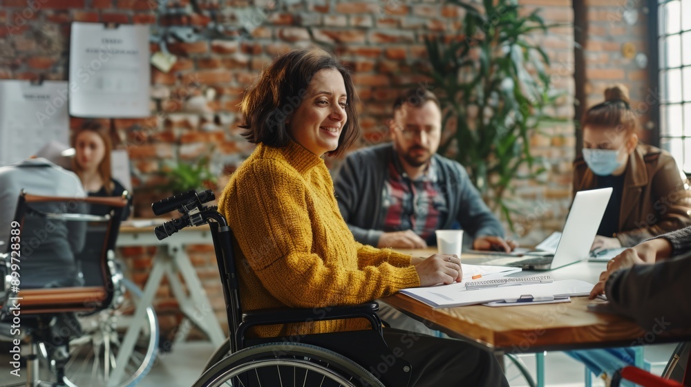 Poster smiling woman in a wheelchair participating in a collaborative office environment. emphasizing workp