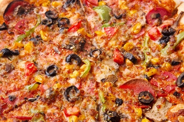 Delicious close up of a fresh handmade pepperoni pizza with cheesy