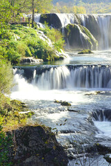 Landscape with waterfall Štrbački buk, located on the Una River. The most beautiful places in Bosnia and Herzegovina - natural attractions. View of the cascading water.      