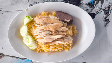 Chicken rice on a plate in a restaurant