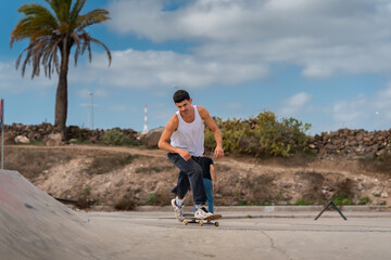 young man skating in a skate park.   © magui RF