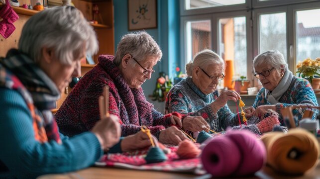 Elderly participants focus on knitting and crafting, sharing techniques and enjoying each other's company in a warm, inviting learning environment. Generative AI