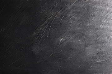 Superficie con texture materica molto irregolare dipinta di colore grigio-nero; spazio per testo