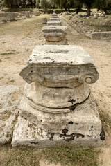 Olympia archaeological site with parts of columns, Greece