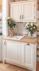 A modern kitchen setup features a white sink cabinet with wooden countertops, styled with simple decor and plants, creating a clean and inviting cooking space
