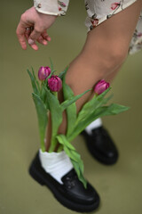 the girl with the bright pink tulips