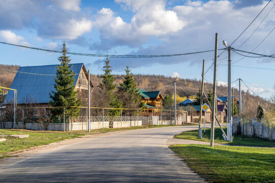 The peaceful village of Zhiguli, with the local houses and the empty road, Samara oblast, Russia.
