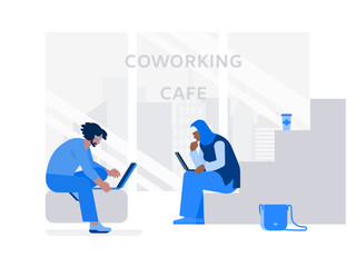 Woman in hijab, man with laptop are working together in coworking cafe