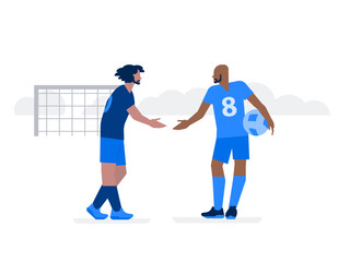 Male football players greeting each other with handshake on the field