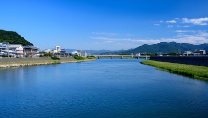 夏の青空と町中を流れる一級河川5