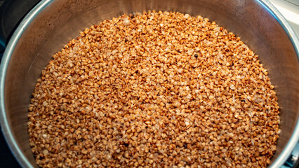 A buckwheat dish in a metal pot