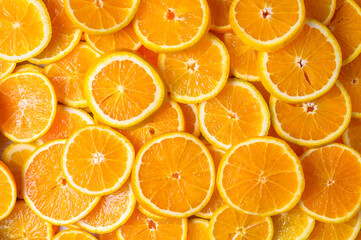 The background is orange slices.