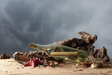 Message in a vintage bottle on a sea shore.