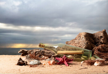 Message in a vintage bottle on a sea shore.