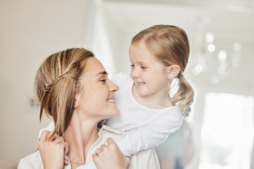 Smile, girl and woman with hug in home for childhood connection, care and bonding together on weekend. House, family and mom with embrace of daughter in living room for motherhood, happiness and love