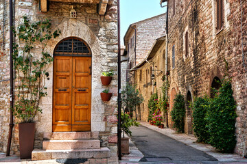 Beautiful charming streets of the historic old town of Assisi, Italy
