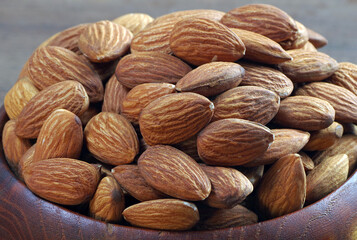 nuts. almonds in a bowl close up