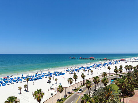 View of Clearwater beach with umbrellas and chairs. Florida, USA.