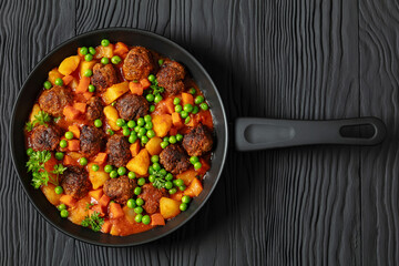 turkish meatball stew, sulu kofte, in a pan