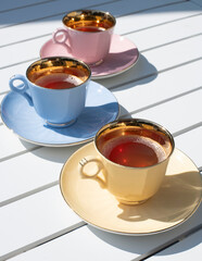 pastel cups of tea