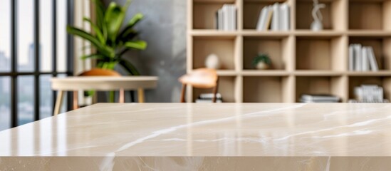 A beige marble countertop in the foreground, with an out-of-focus living room interior featuring bookshelves