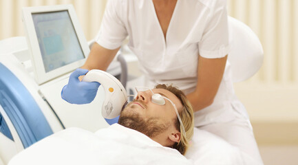 Obraz premium Photorejuvenation,Cosmetic Laser Dermatology ,dermatologist offices,laser technology.